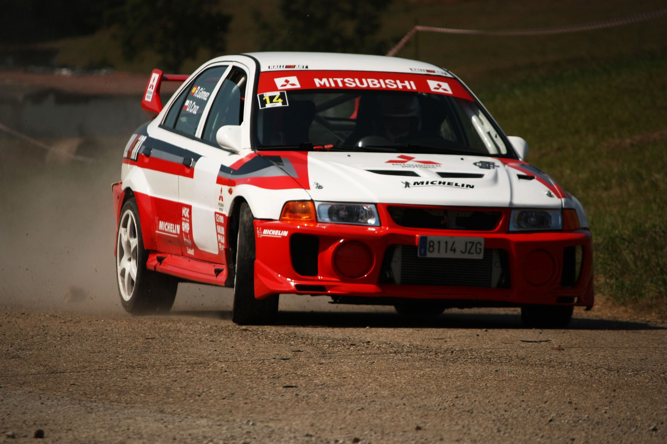 Red and White Racing Car on the Road · Free Stock Photo