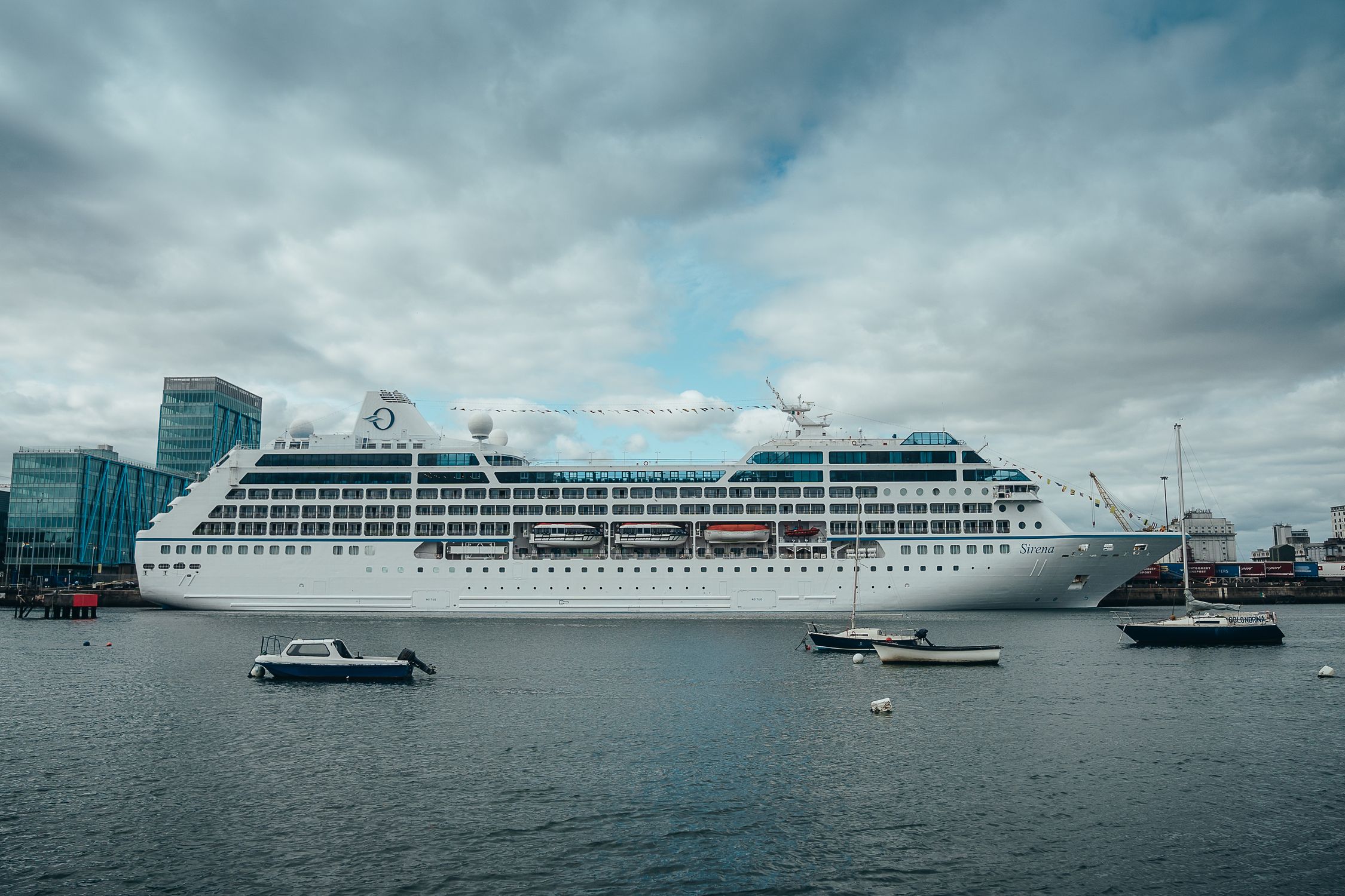 White Cruise Ship on Sea Under White Clouds and Blue Sky · Free Stock Photo
