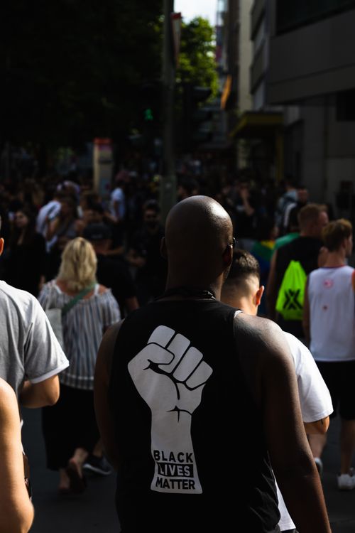 Free Back view of diverse crowd at social justice protest in Berlin, highlighting unity. Stock Photo