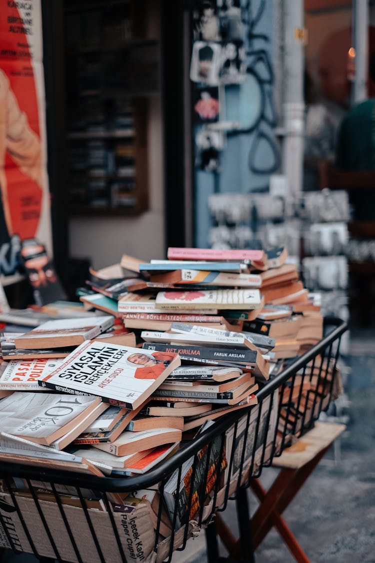 Books In Basket Selling Outdoors