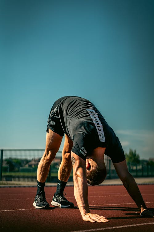 A Man Stretching His Body