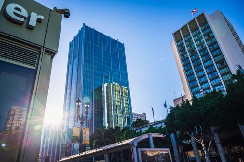 Free Cityscape view of downtown San Diego with tall buildings under a clear blue sky. Stock Photo