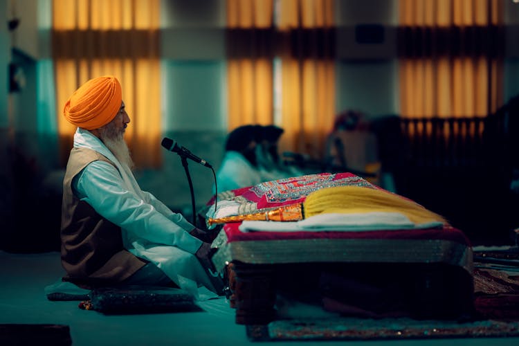 Man In Turban Sitting During Ceremony