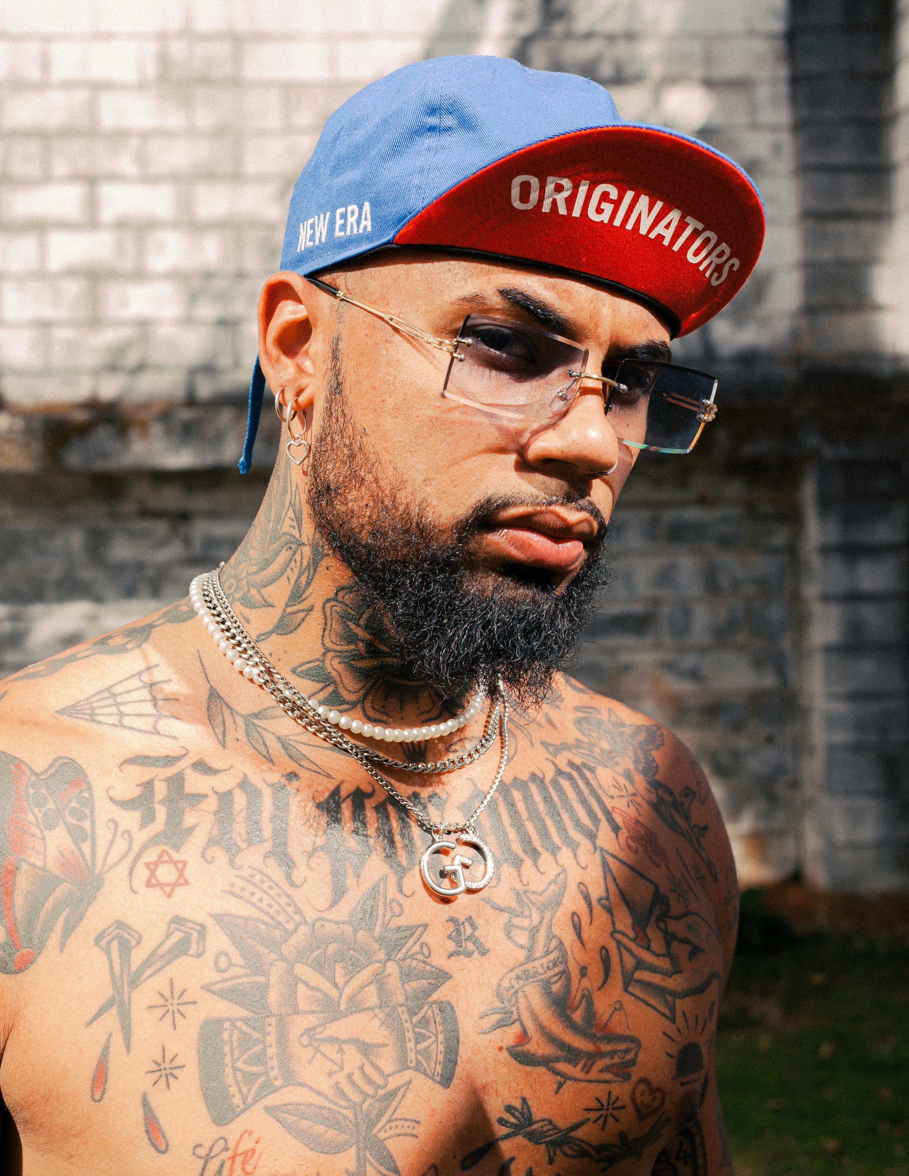 Portrait of Rapper on Dollar Wall Background · Free Stock Photo