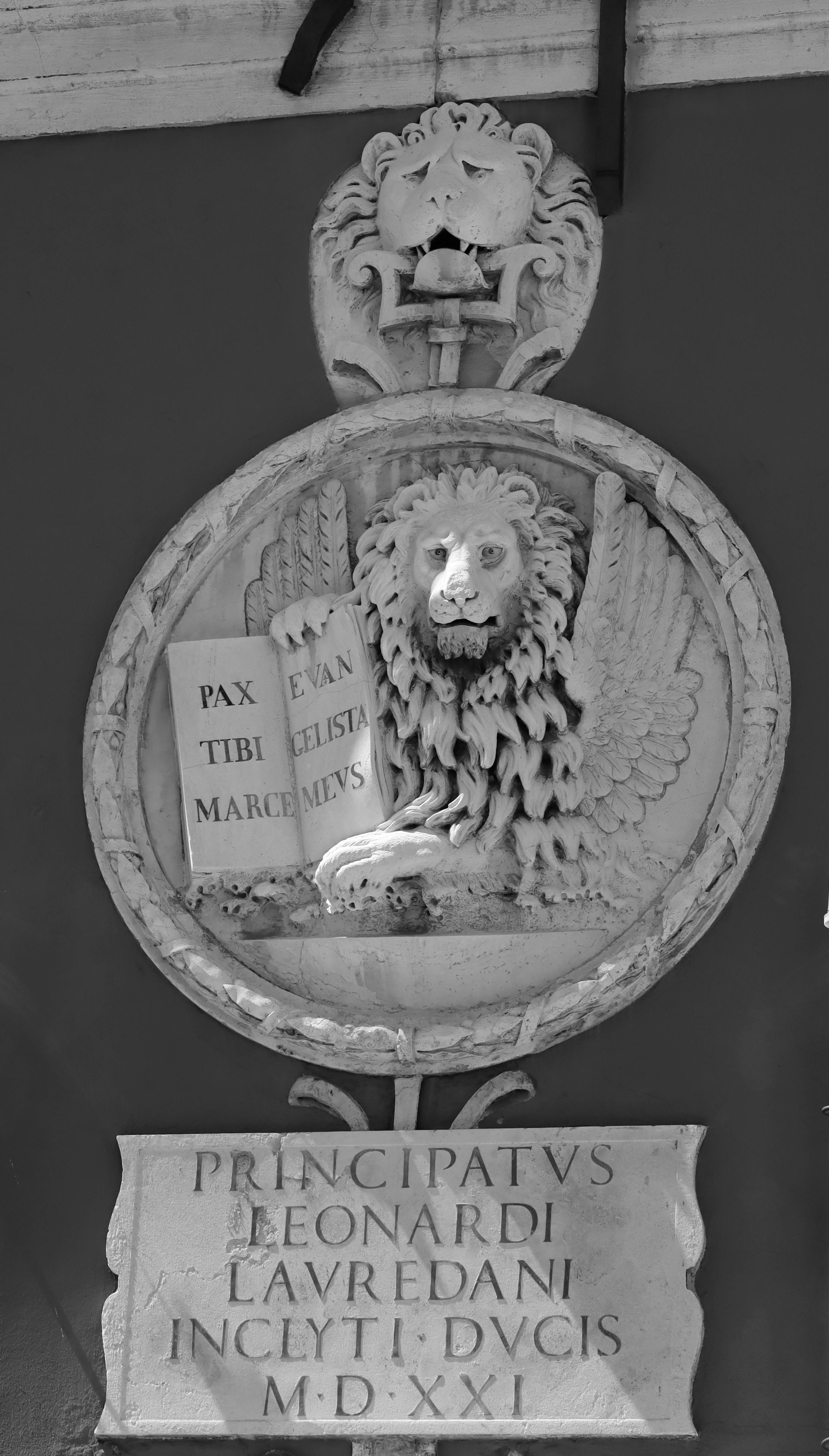 Close-up of a lion sculpture on a monument in Venice, Italy.