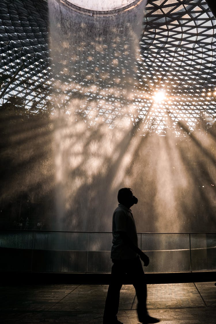 Silhouette Of Man Wearing Facemask