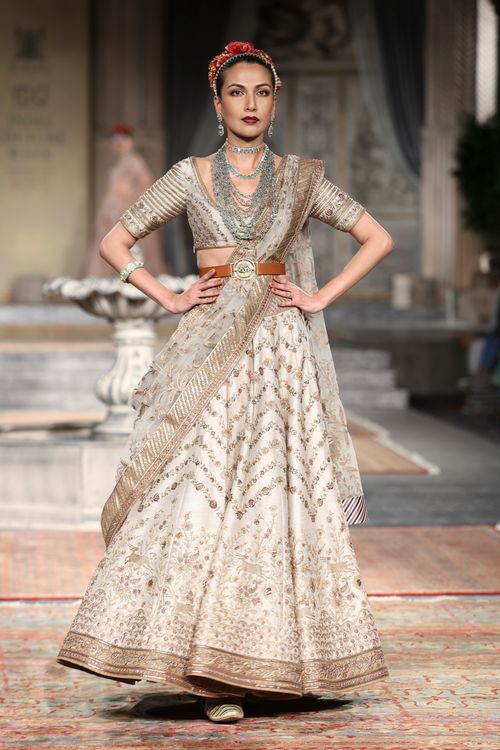A Woman in Saree Dress Posing at the Camera Free Stock Photo A Woman in Saree Dress Posing at the Camera Free Stock Photo