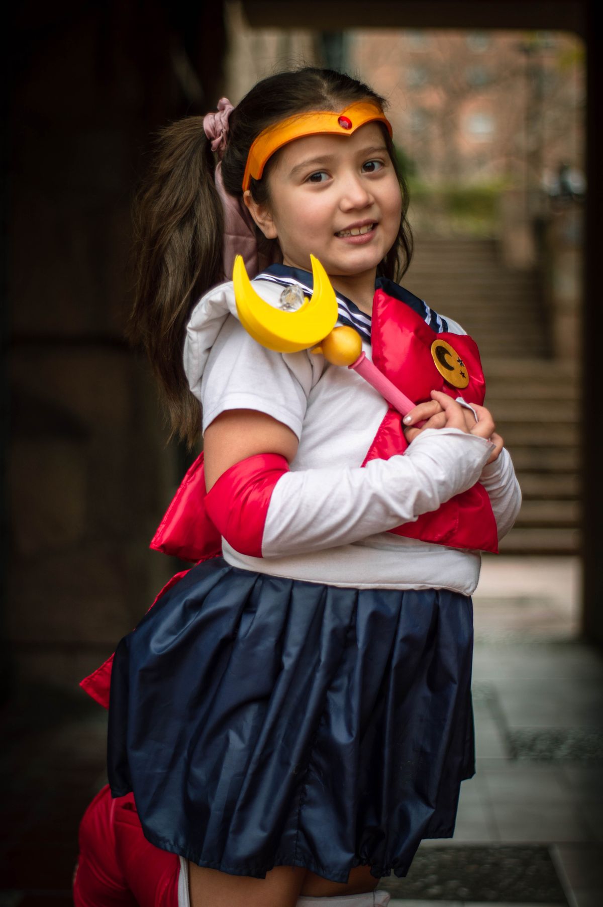 Young cosplayer posing confidently in an anime costume
