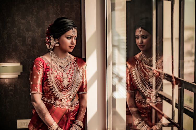 Indian Bride Leaning Against Window