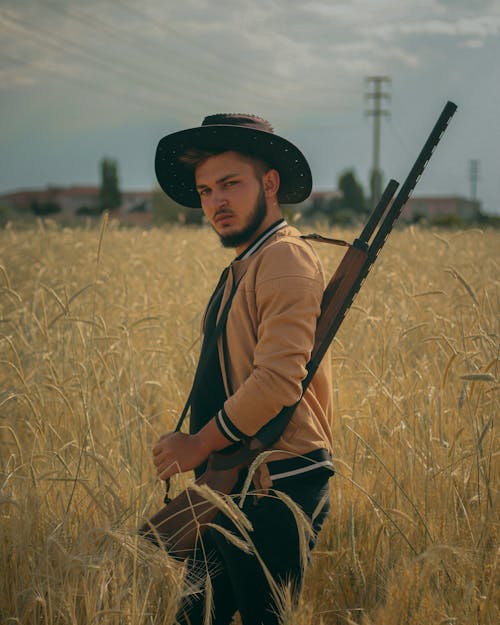 Imagine de stoc gratuită din câmp de iarbă, chipeș, cowboy