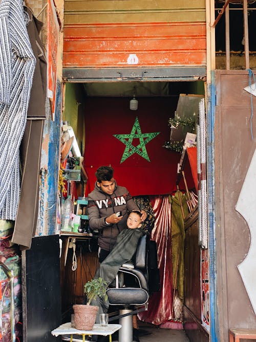 A kid Having a Haircut