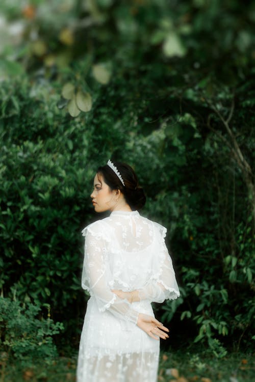 A Woman Wearing White Dress 