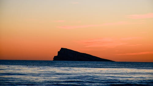 Gratis stockfoto met dageraad, eiland, gebied met water