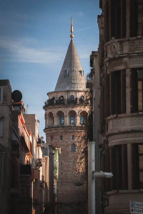 Photo of Buildings Near a Tower