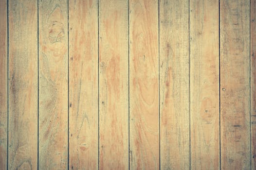 这张高分辨率图像展现了质朴木板的清晰纹理，非常适合用作背景