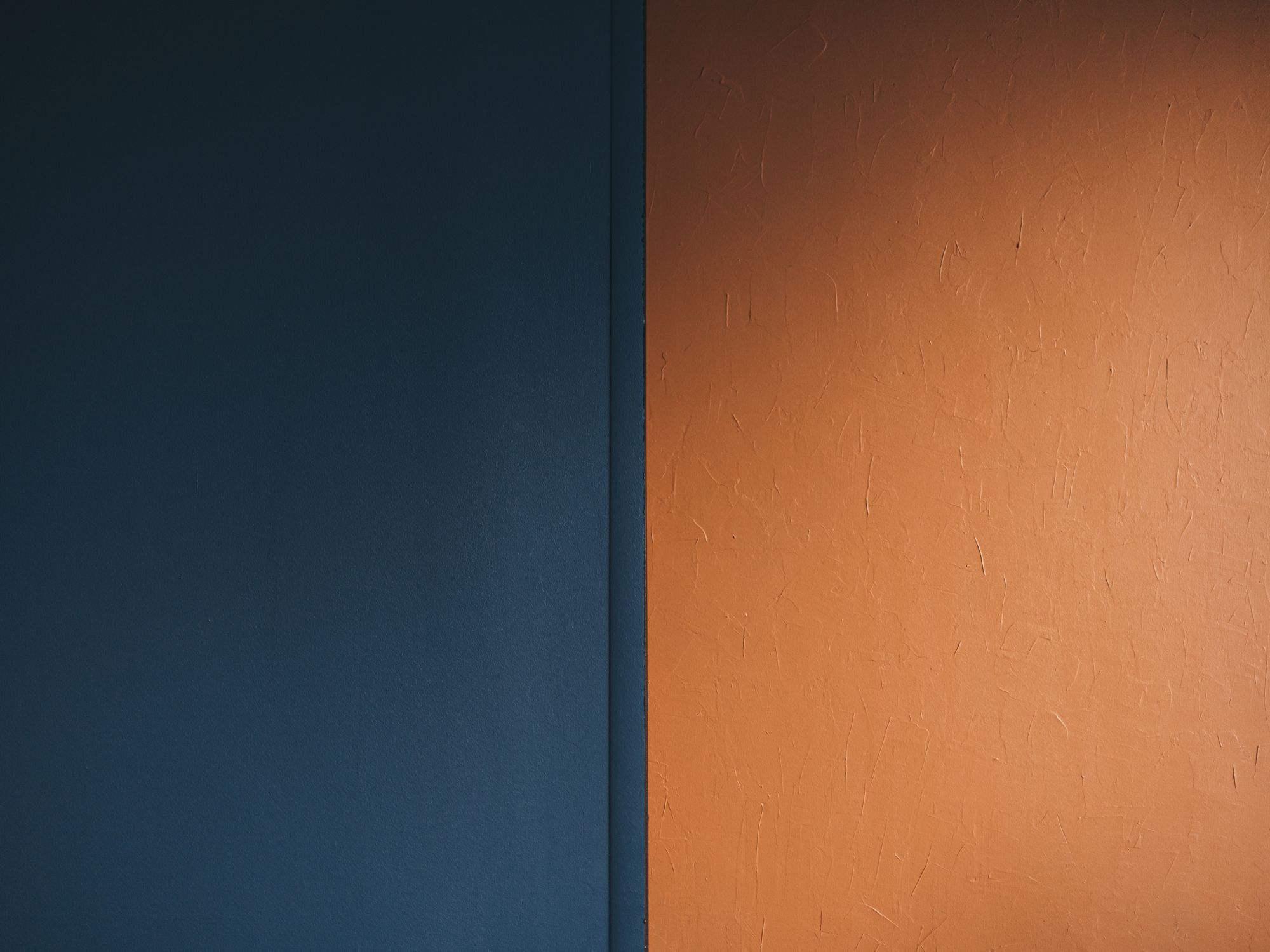 Painters & Decorators in Yiewsley, London — professional decorator painting a wall with a roller