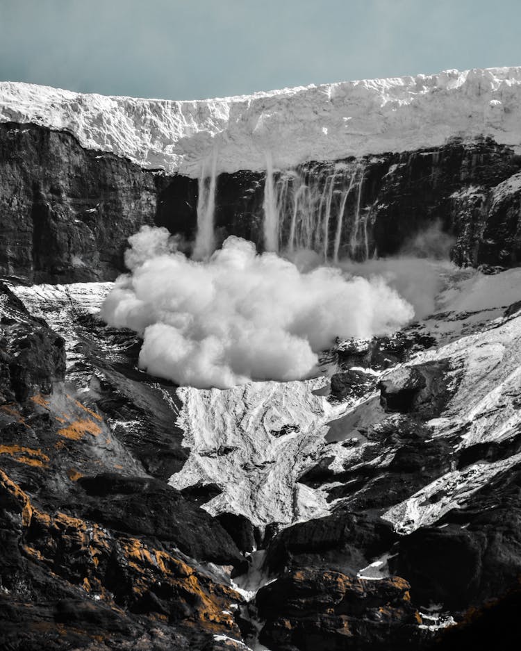 Close-Up Photo Of Snow Avalanche On Mountain