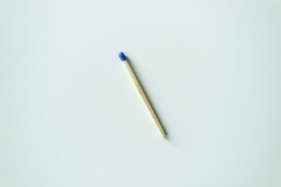Matchstick On White Surface