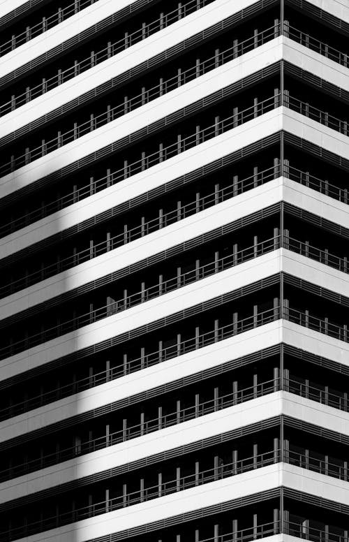 Grayscale Photo of a High Rise Building