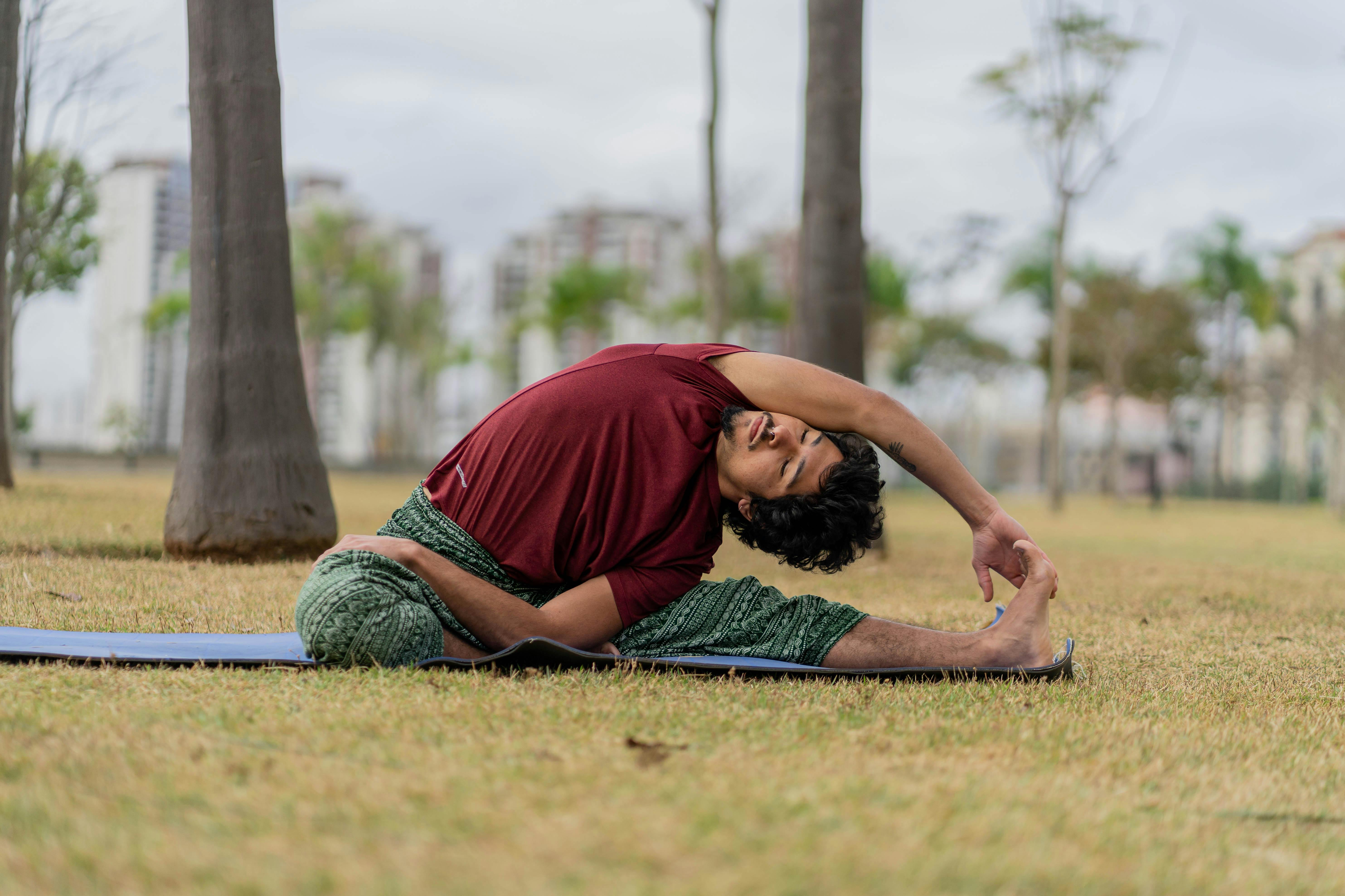 Yoga instructor performing advanced yoga balance pose