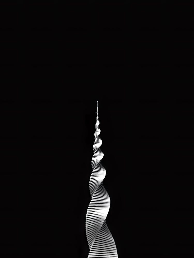 Modern Metallic Tower On Black Background