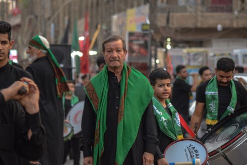 Free Vibrant street parade showcasing traditional attire and musical drums. Stock Photo