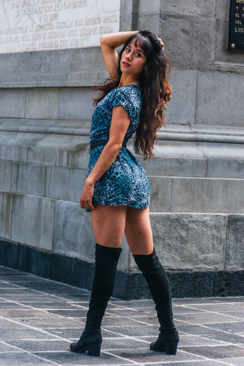 Woman in Short Dress and Boots Looking Back Free Stock Photo Woman in Short Dress and Boots Looking Back Free Stock Photo