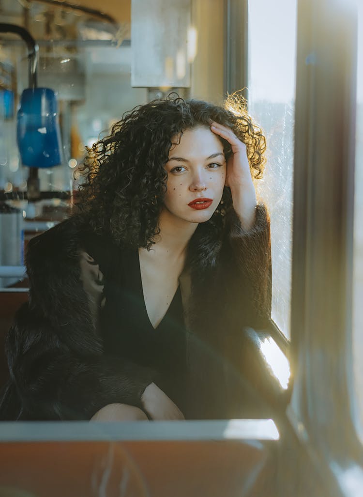 Beautiful Woman With Hand In Hair