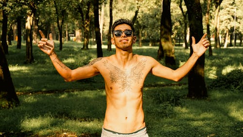 Topless Man Wearing Sunglasses