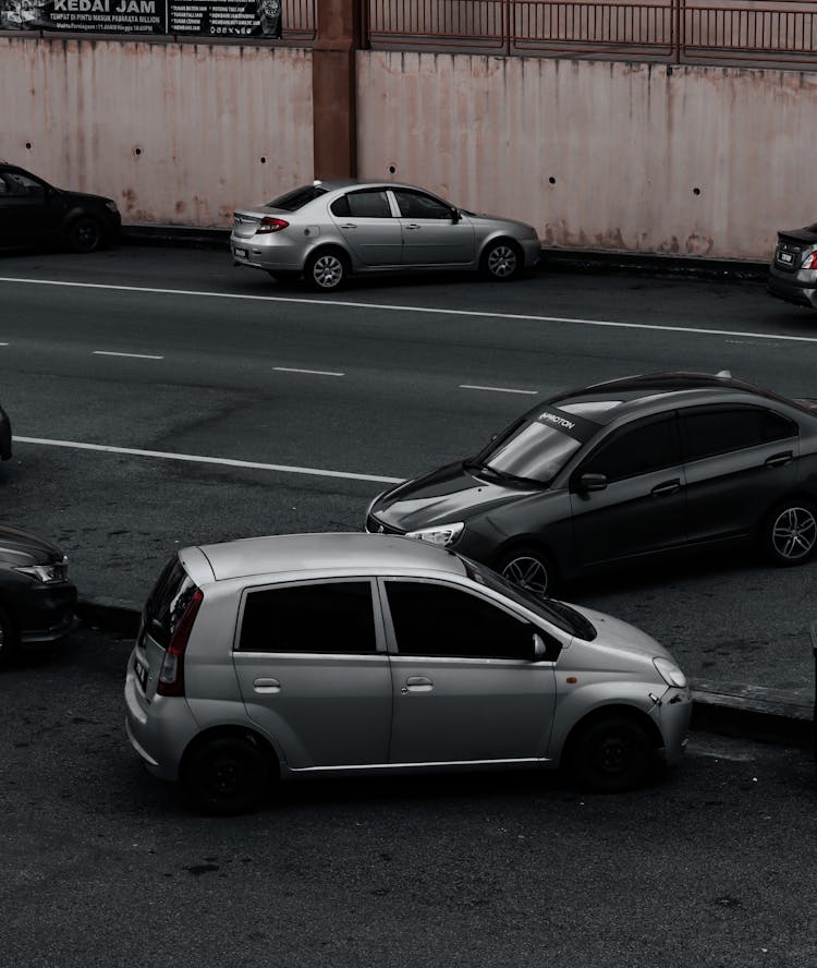 Photo Of Cars Parked On Roadside