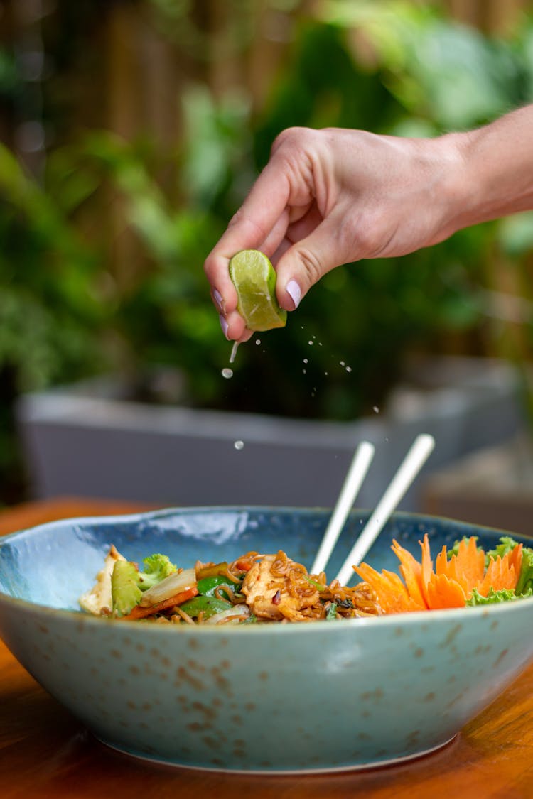 Squeezing Lime Into Meal