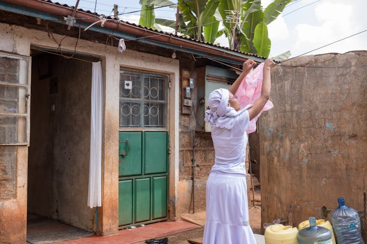 Woman Hanging Laundry