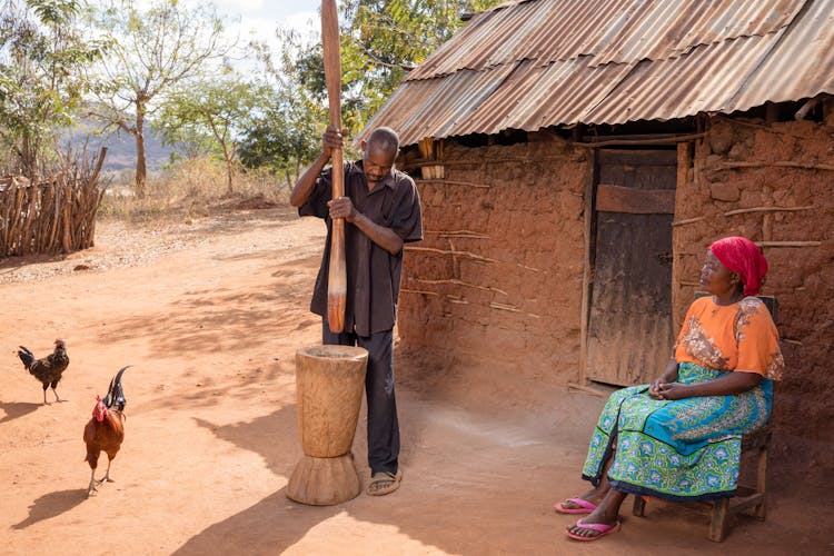 Family Working In African Village