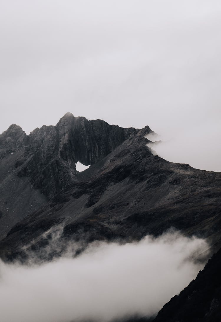 Rock Mountain Covered With Fog