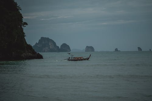 Fishing Boat in Water on Dawn