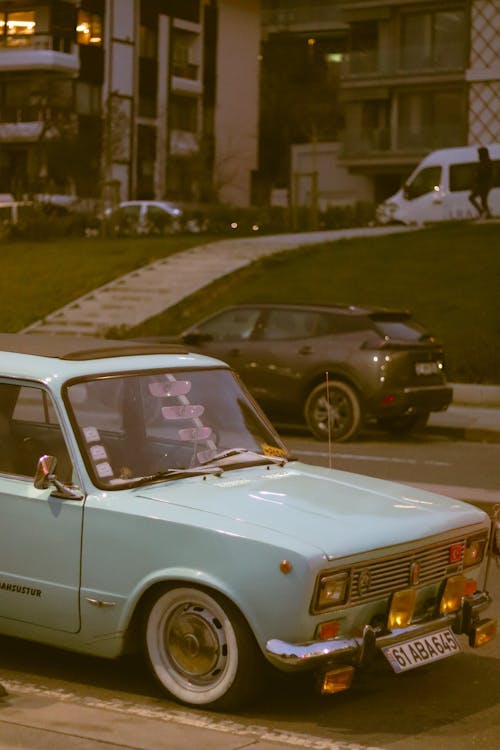 Small Car Parked on Street Side