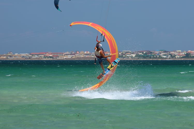 Man Midair Kitesurfing 