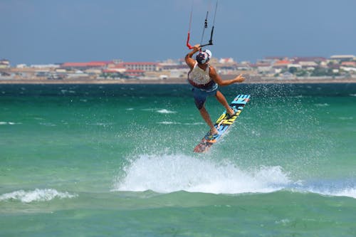 Photo of a Man Kiteboarding