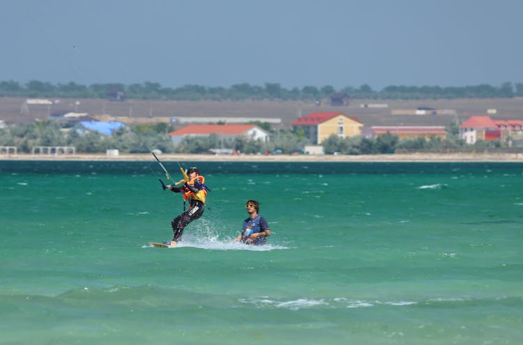 Kite Surfing Learner With Instructor