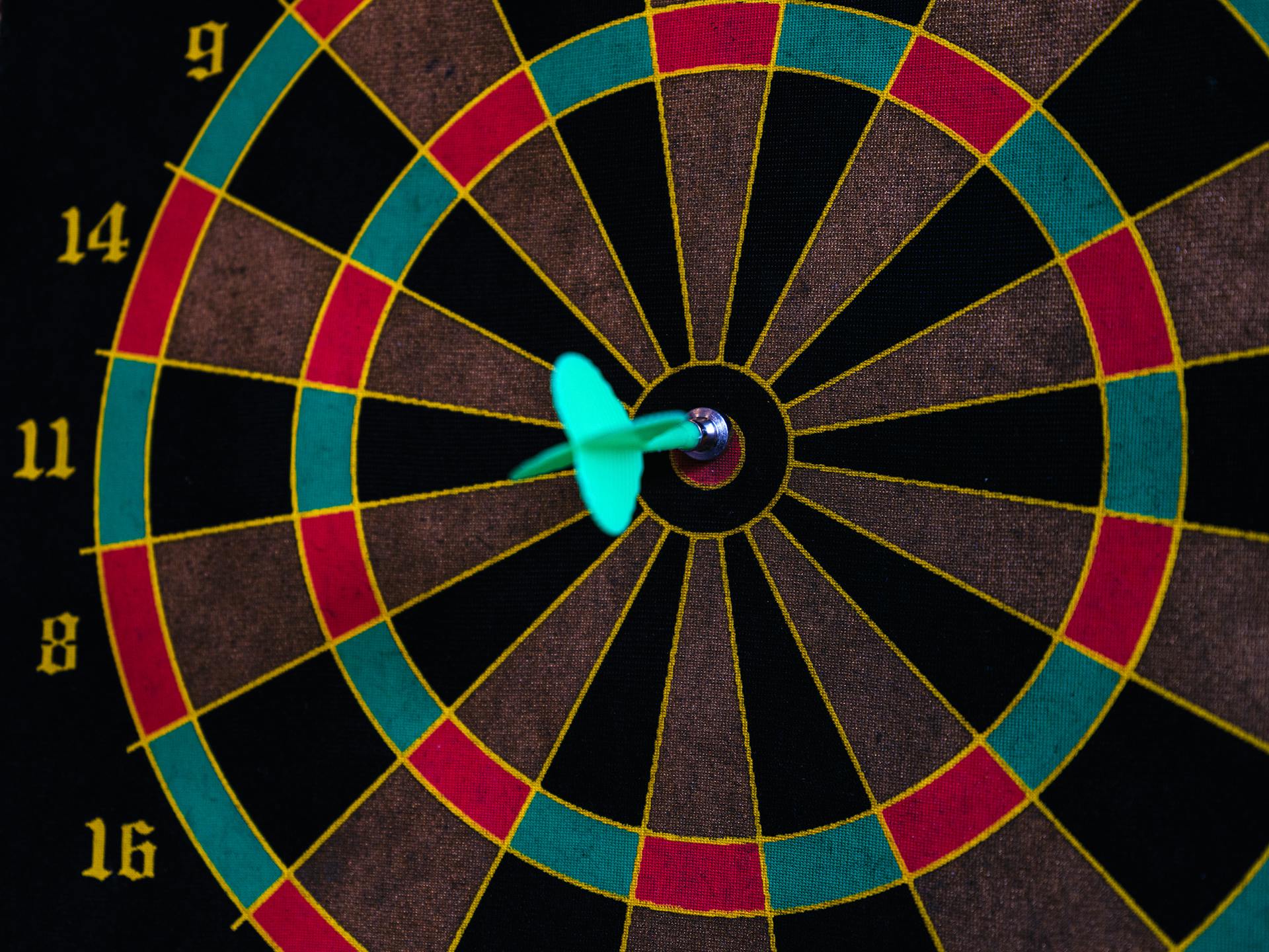 A Dart Hitting the Board's Bullseye