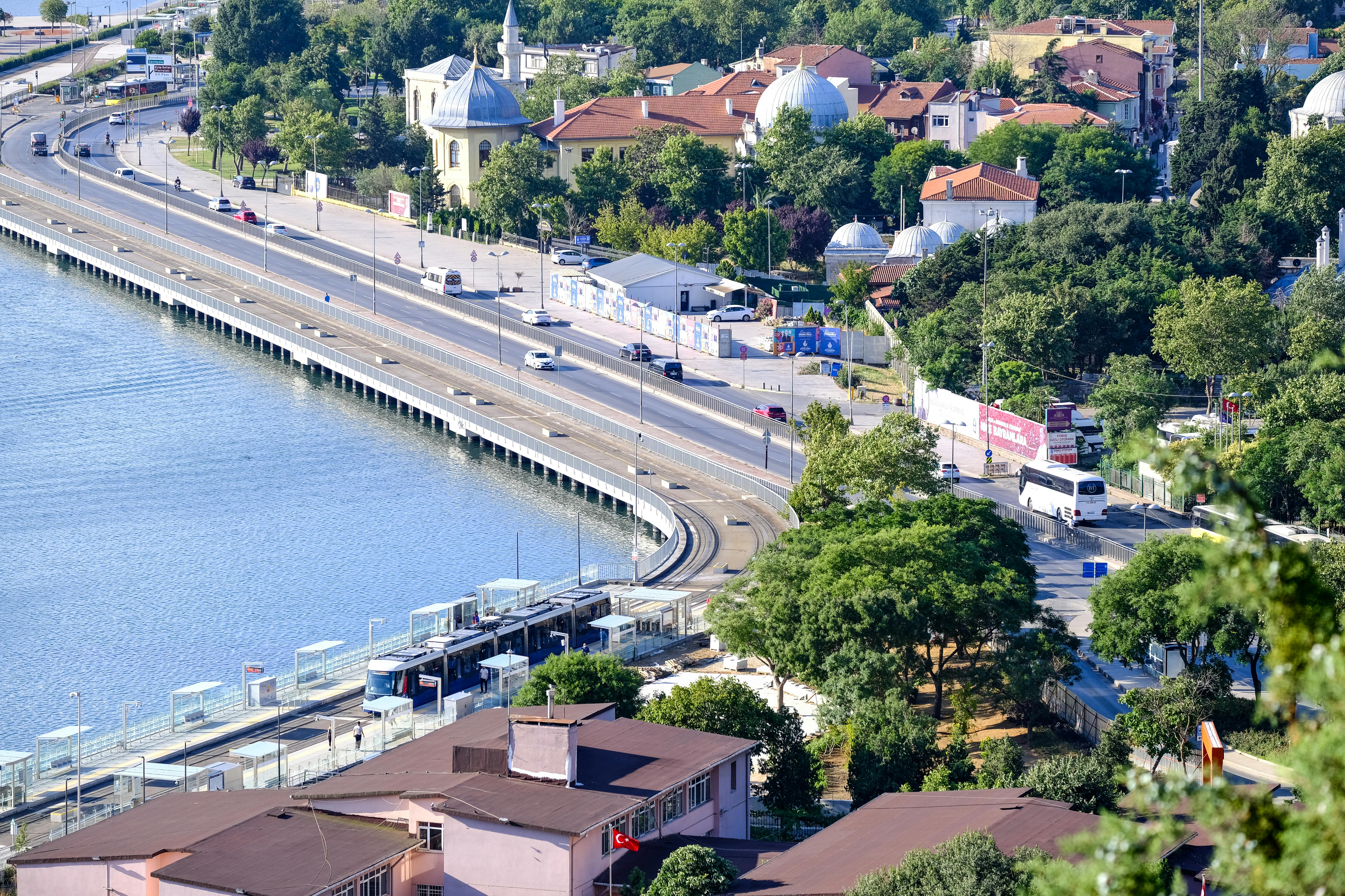 coastal highway road and houses overlooking sea