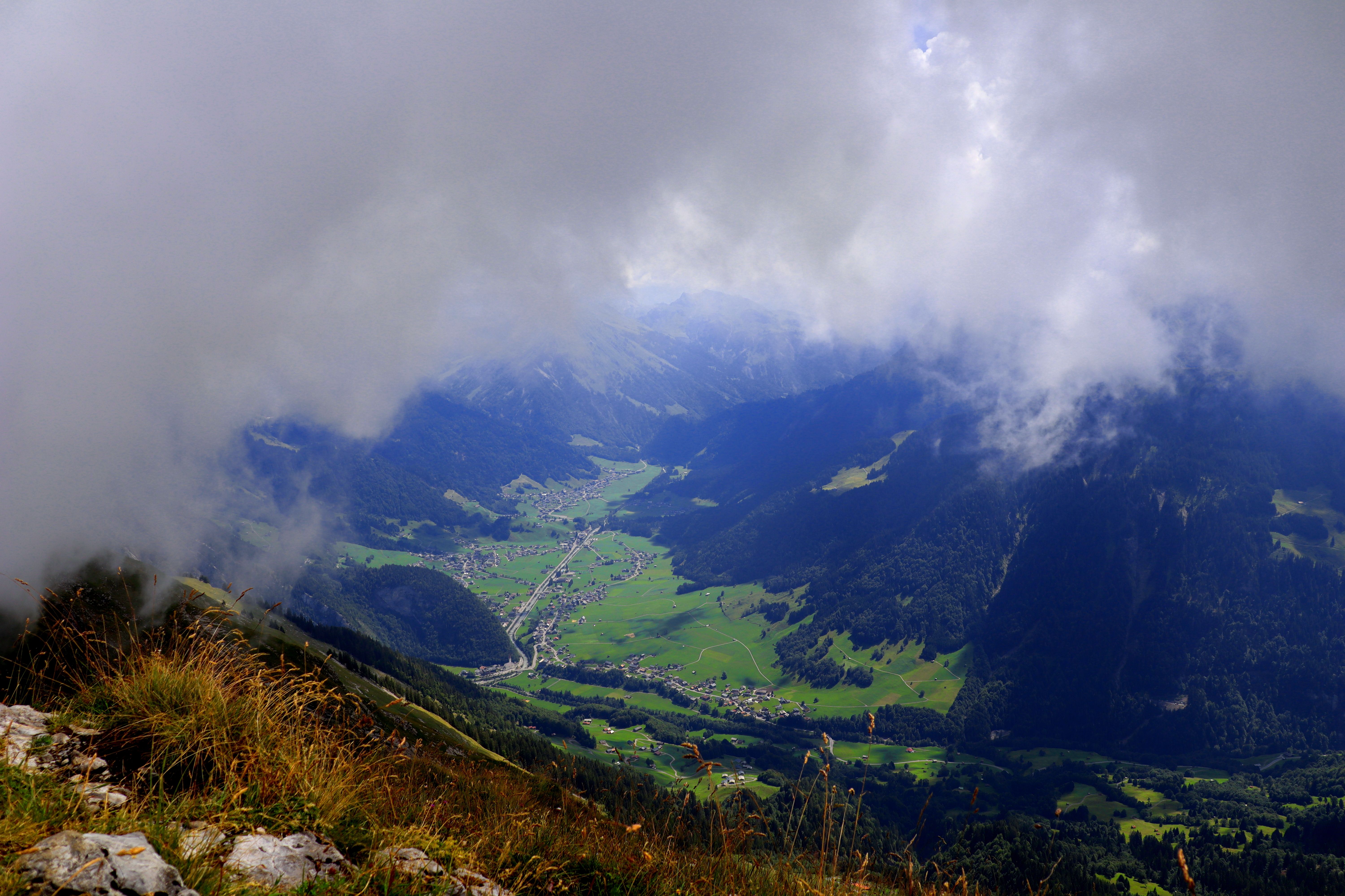 Aerial Photography of Mountains under the Cloudy Sky · Free Stock Photo