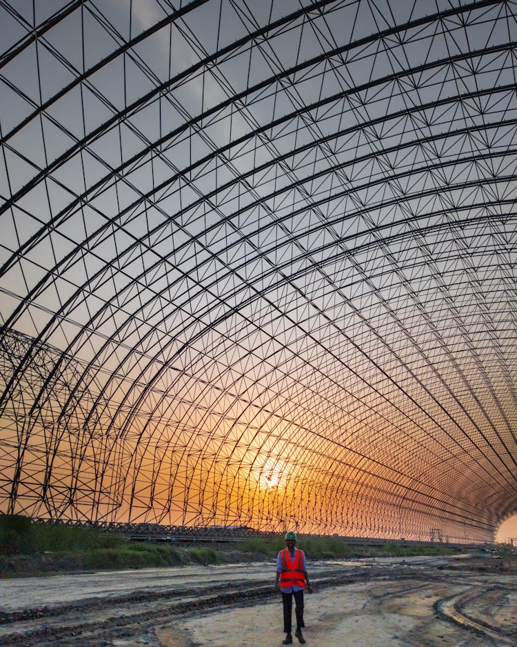 Worker Under Frames Construction