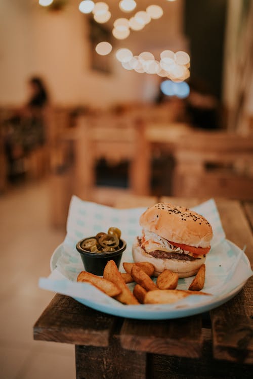 Burger and Fries on Ceramic Plate