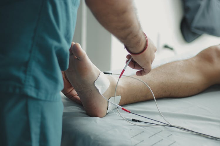 Leg Of Patient On Bed