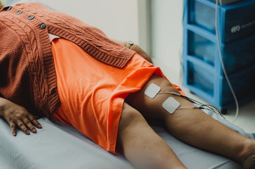 Legs of Woman Lying Down in Hospital