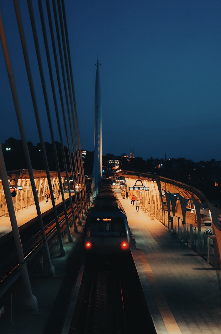 Illuminated Train Platform During Night Time