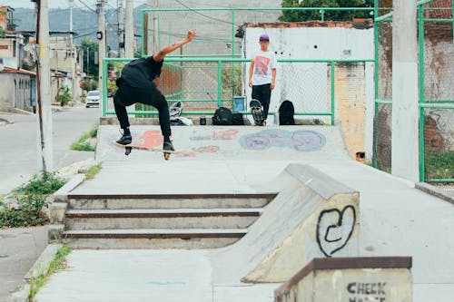 Person Skateboarding on Skate Ramp