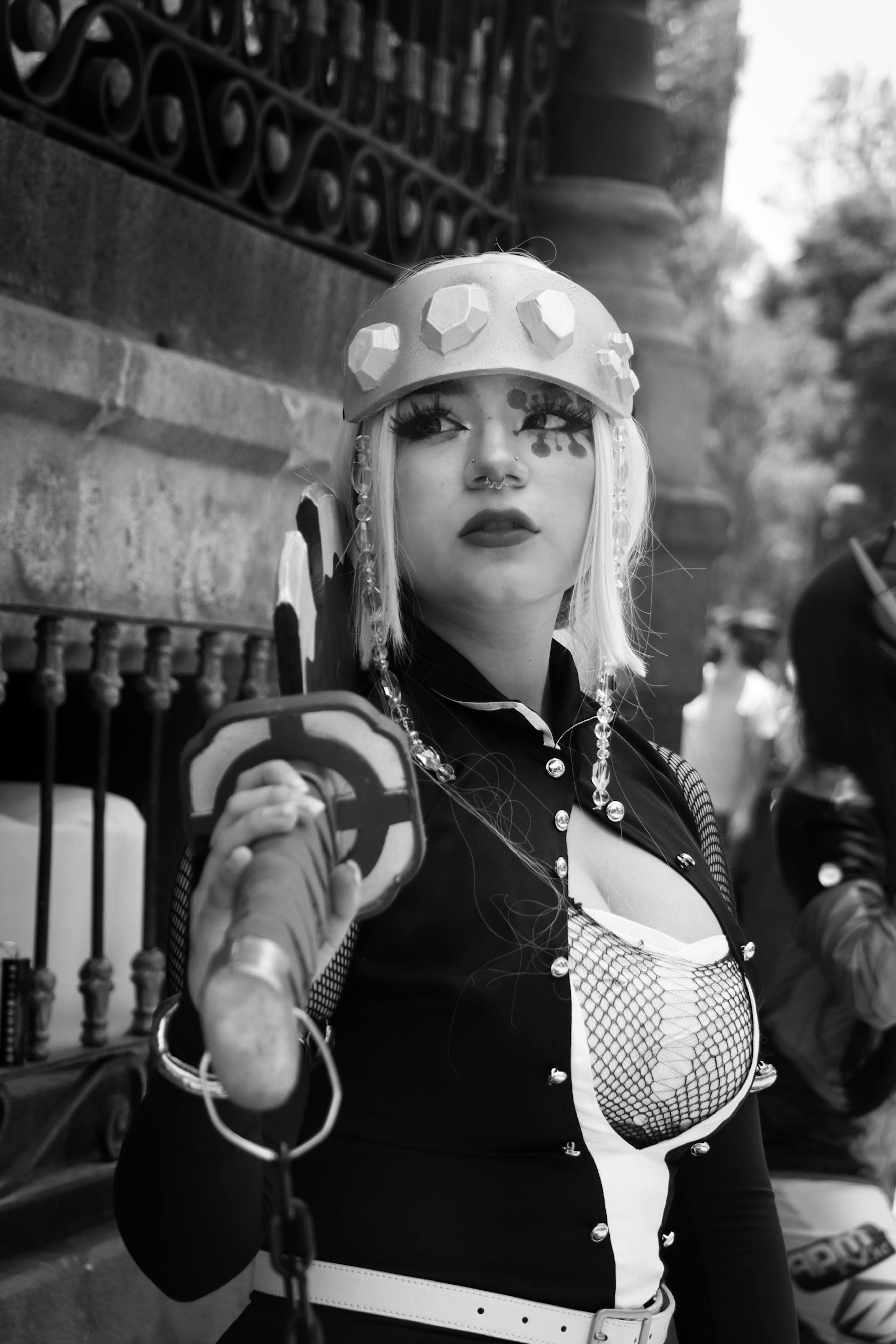 Grayscale Photo of a Female Cosplayer Wearing Her Costume Free