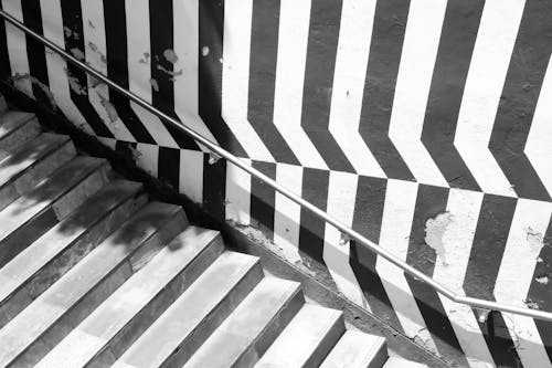 Grayscale Photo of a Staircase